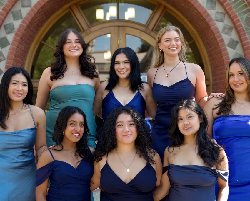Group of students with PHC banner