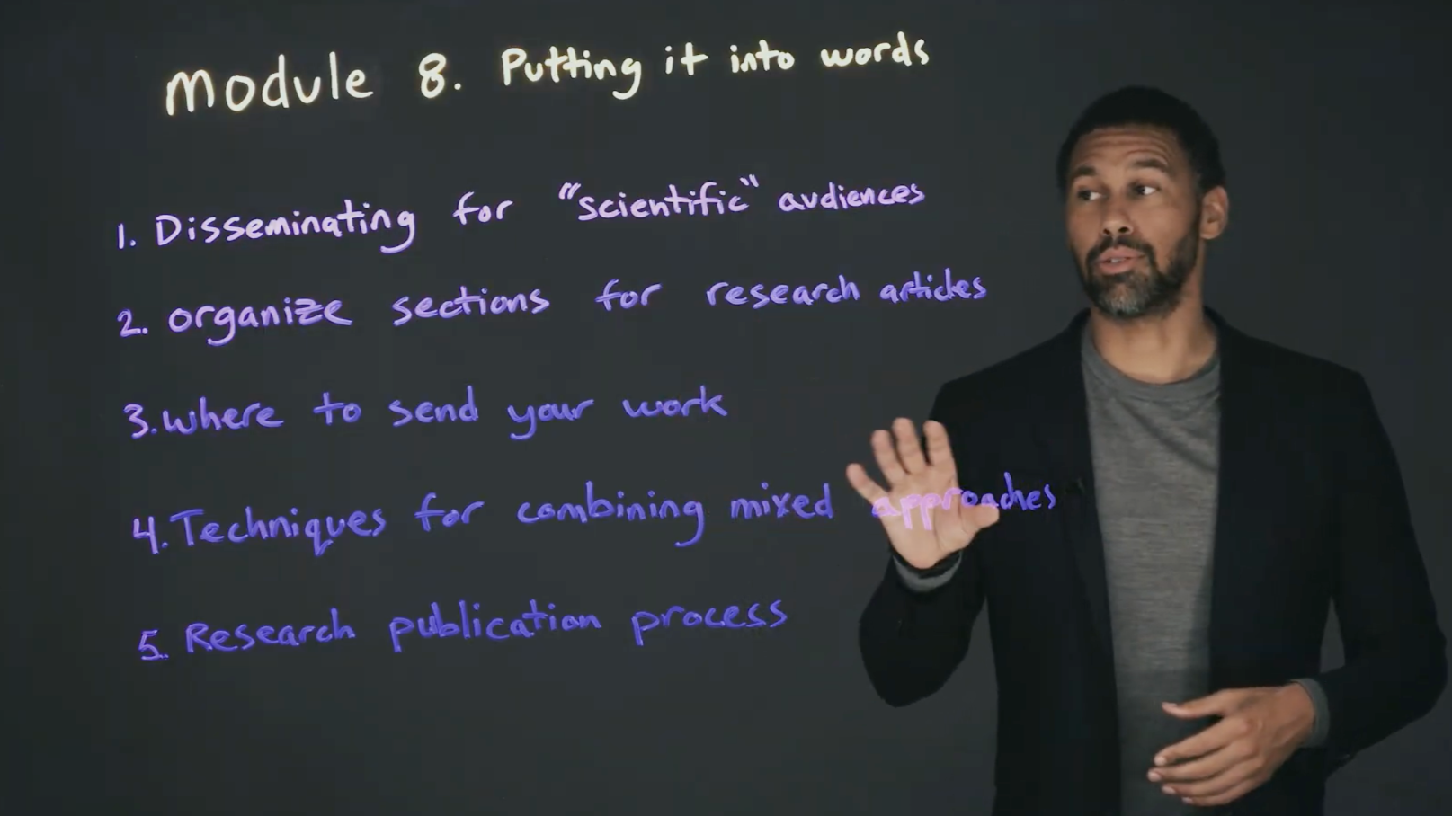 SJSU professor teaching an online course with an illuminated board